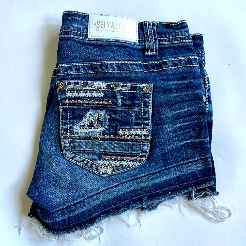Shyanne denim short shorts. Embroidery & rhinestones embellishments.  Size 30
